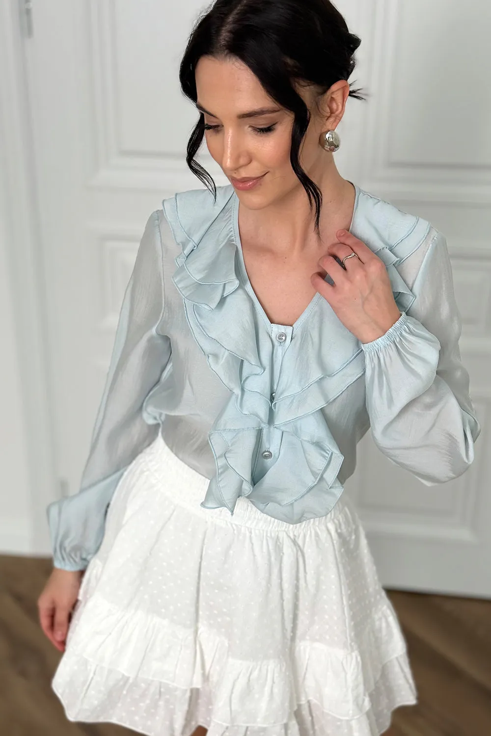 Blue blouse with double ruffles