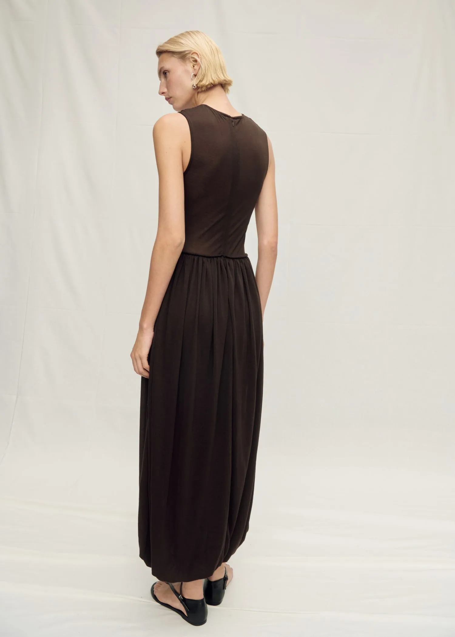 Semi-transparent dress with puffed hem