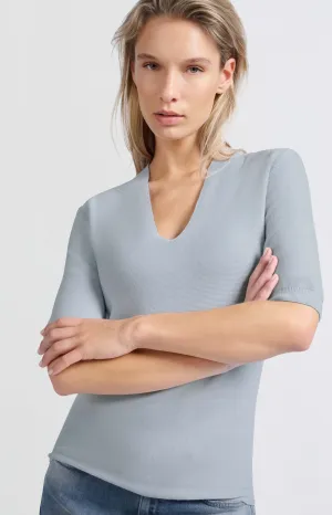 Soft sweater with deep V-neck and short sleeves